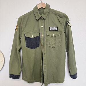 Unique reworked army-style shirt with denim pocket contrast and distressed cuf
